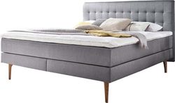 Světle šedá čalouněná dvoulůžková postel s matrací Meise Möbel Massello, 180 x 200 cm