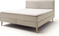 Béžová čalouněná dvoulůžková postel s matrací Meise Möbel Greta, 160 x 200 cm
