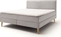 Světle šedá čalouněná dvoulůžková postel s matrací Meise Möbel Greta, 160 x 200 cm