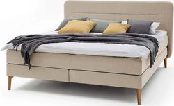 Béžová čalouněná dvoulůžková postel s matrací Meise Möbel Massello, 160 x 200 cm